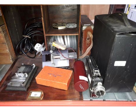 A Kodak Cine camera, a Kodascope Eight film viewer, a Leitz Wetzlar slide projector, an Ensign Splicer and various films. 