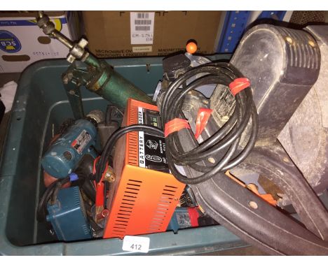 A box of tools including bench saw, batery charger, drills, bstteries - ALL AS FOUND 