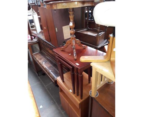 Four items of furniture comprising a teak HiFi cabinet, a nest of tables and two tripod tables. 