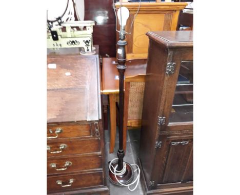A turned standard lamp. 