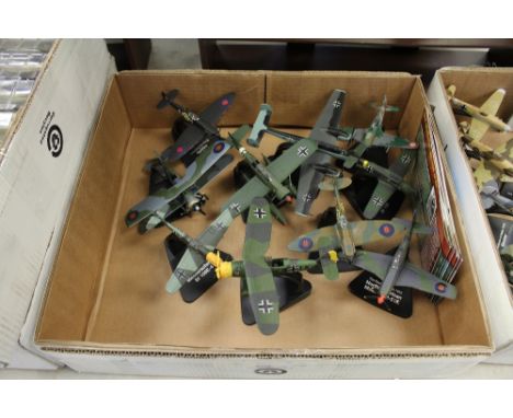 Box of model war planes and stand