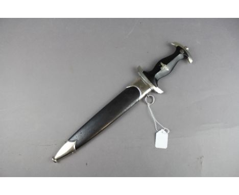 A Good WW2 Nazi SS Dagger. Makers marked "Robert Klass Solingen". Blade etched " Meine Ehre Heist Treue". Held within scabbar