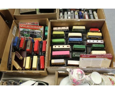 2 boxes of model buses