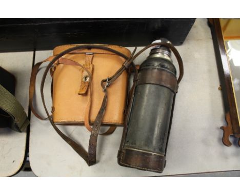 Cased set binoculars and leather bound Stanley flask