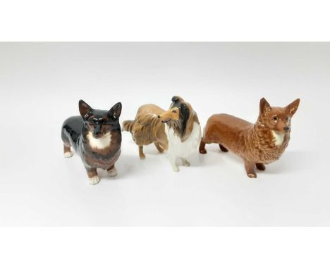 Three Beswick dogs - Black Prince, model no. 1299A, designed by Arthur Gredington, 14cm high, Corgi, model no. 1299B, designe