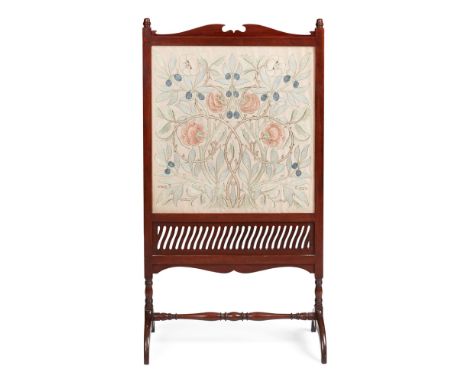 WILLIAM MORRIS (1834-1896) FOR MORRIS & CO.  MAHOGANY FRAMED EMBROIDERED FIRESCREEN, CIRCA 1880   the frame enclosing a glaze