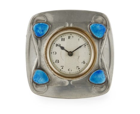 ARCHIBALD KNOX (1864-1933) FOR LIBERTY & CO., LONDON  'TUDRIC' PEWTER AND ENAMEL STRUT CLOCK, CIRCA 1900   the circular dial 