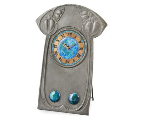 ARCHIBALD KNOX (1864-1933) FOR LIBERTY & CO., LONDON  'TUDRIC' PEWTER AND ENAMEL MANTEL CLOCK, CIRCA 1900   with a curved top