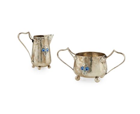 JAMES FENTON & CO., BIRMINGHAM  ART NOUVEAU SILVER AND ENAMEL SUCRIER AND CREAMER, 1905   with applied plant form decoration 