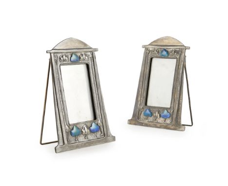 ATTRIBUTED TO LIBERTY & CO., LONDON  PAIR OF ARTS & CRAFTS PEWTER AND ENAMEL PHOTOGRAPH FRAMES, CIRCA 1900   each cast with s