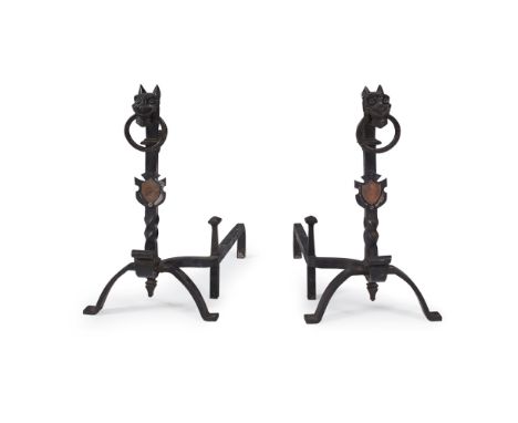 SCOTTISH SCHOOL  PAIR OF WROUGHT IRON FIRE DOGS, CIRCA 1930   each with beast head finials and ring handles on writhen column