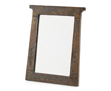 ARTS AND CRAFTS  COPPER FRAMED DRESSING MIRROR, CIRCA 1900   of splayed rectangular form, with stylised repoussé roses to eac