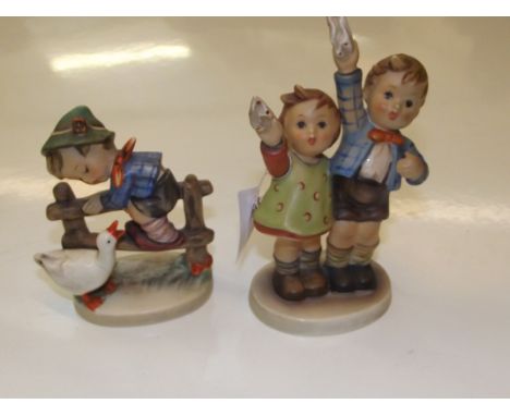 Two Hummel figures