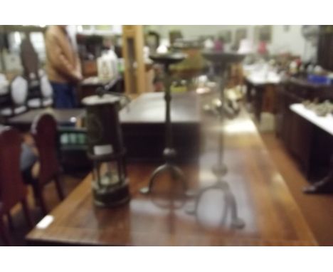 Brass miners lamp together with a pair of candle stands