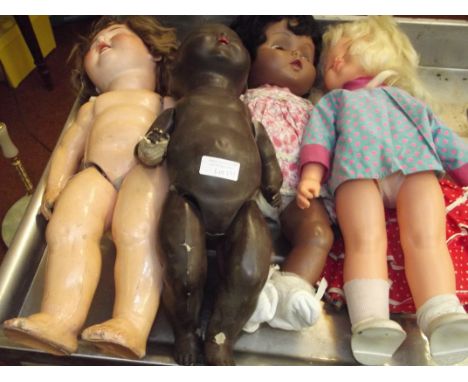 Four vintage dolls
