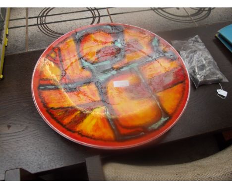 Large Poole pottery charger, IH monongram