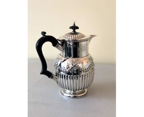 Antique Silver Victorian JugStunning Victorian sterling silver jug, hallmarked Walker and Hall, Sheffield 1898. Decorated wit