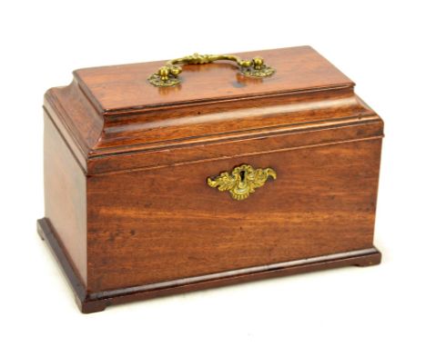 A George III mahogany tea caddy, the hinged lid with central brass carrying handle now fitted with a pen tray and three squar