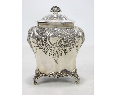 LEE &amp; WIGFULL; a Victorian hallmarked silver tea caddy of shaped rectangular form with repoussé foliate scroll decoration