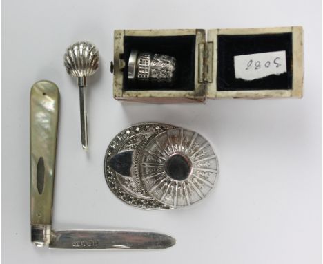 Four variously hallmarked silver items comprising a jockey's cap shaped caddy spoon with vacant cartouche, Francis Howard, Sh