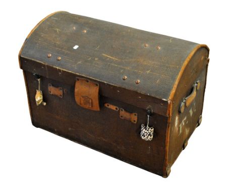 A twin handled canvas travelling trunk with domed top and initialled 'F.V.' to each side, width 80.5cm. CONDITION REPORT: Hea