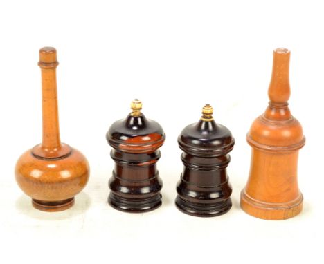 Two similar late 19th century/early 20th century turned boxwood glove powderers, height 13cm, and a pair of turned lignum vit