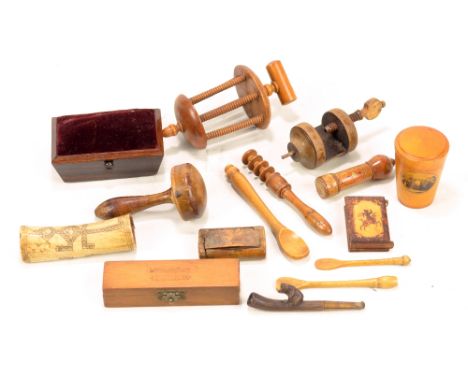 A group of sewing related collectors' items including a weighted rosewood pin cushion of rectangular form, length 11.5cm, a s