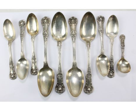 WILLIAM EATON; a set of Victorian hallmarked silver double struck Queen's pattern spoons comprising four tablespoons, five de