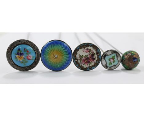 Five various hat pins to include a sterling silver mounted porcelain swivel example painted with floral sprays, length 20.5cm