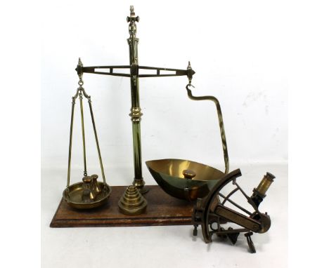 A set of brass scales by Reuben Sutcliffe of Manchester and various weights including Victorian and Avery examples, also a re