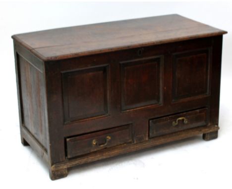 An oak blanket box with three panel front above two drawers, approx 72 x 119 x 55cm. CONDITION REPORT: Heavy wear throughout,
