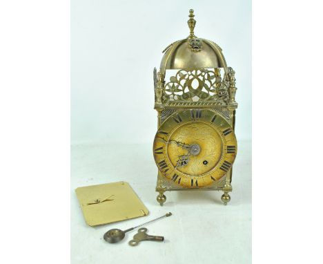 A 20th century brass lantern clock, the dial inscribed 'Edward East', height 38cm.