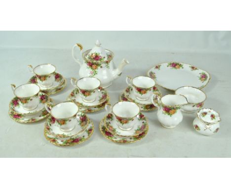 A Royal Albert 'Old Country Roses' pattern tea service comprising teapot, six trios, a cream jug, sugar bowl and a box with c