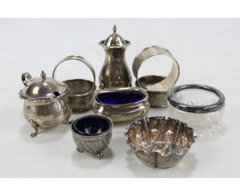 A group of variously hallmarked silver cruet pieces to include a baluster pepper, William Hutton &amp; Sons Ltd, Sheffield 19