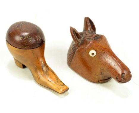 An unusual 19th century naively carved snuff box modelled as a horse's head, with bone inlaid eyes, length 9cm, and a further