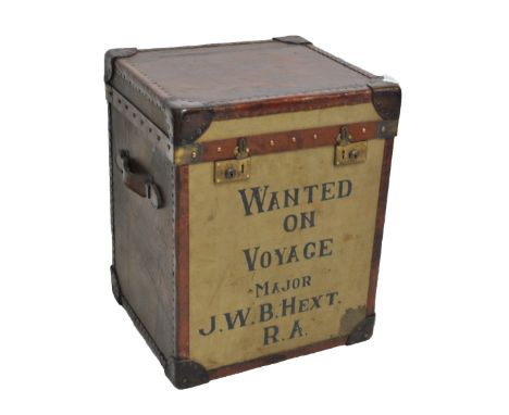 A canvas and leather travelling trunk, inscribed 'Wanted on voyage, Major JWB Hext RA', width 51cm. CONDITION REPORT: This is