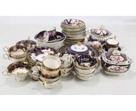 A large quantity of Coalport floral painted blue ground teaware. CONDITION REPORT: Crazing, rubbing to gilt and painted decor