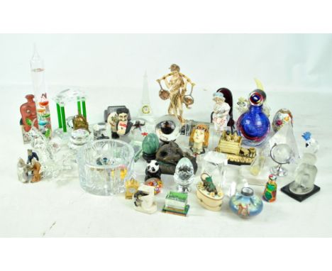 A group of various glass ornaments to include a paperweight, a figure of a cockatoo, an eagle, a globe, a Waterford crystal b