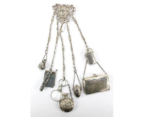 WILLIAM FRANCIS GARRUD; a Victorian hallmarked silver five strand chatelaine with cast and pierced female mask arabesque deco