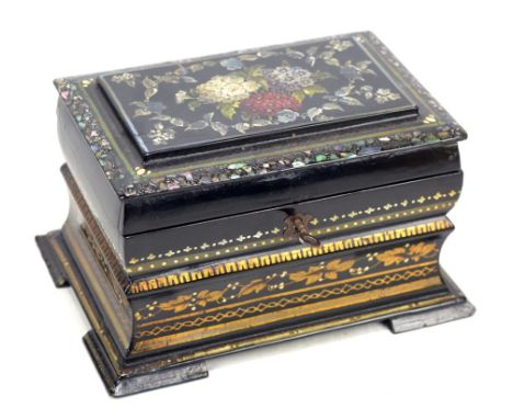 A mid-Victorian papier-mâché tea caddy, the floral decorated mother of pearl inlaid hinged lid enclosing two lidded compartme