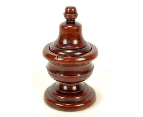A good 19th century yew wood lidded pedestal bowl, the cover with turned knop finial above a baluster turned body with spread
