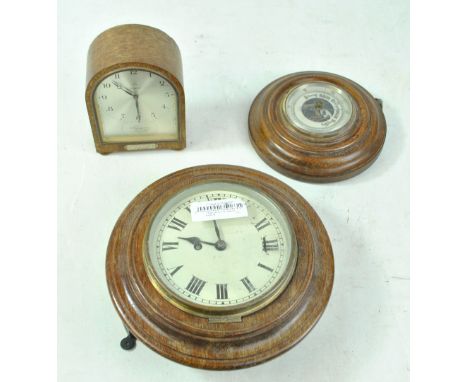 An oak cased wall clock, a small Tempus Fugit eight day mantel clock with applied silver plaque inscribed 'H &amp; A.M.C. 190
