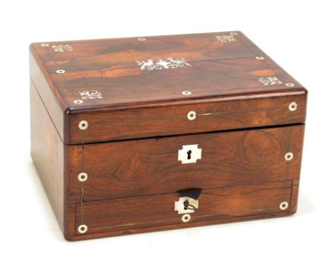 An early Victorian rosewood and mother of pearl inlaid travelling case or vanity box, the hinged lid centred with twin stylis