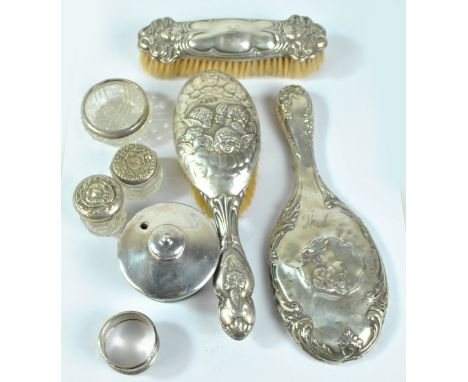 A group of hallmarked silver mounted dressing table items to include Reynold's Angels pattern hand brush, Charles Boyton &amp