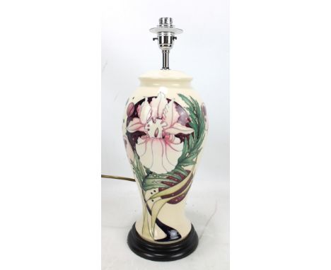 MOORCROFT; a tubeline decorated 'Celestial Bouquet' pattern baluster lamp base on cream ground to circular base, height exclu