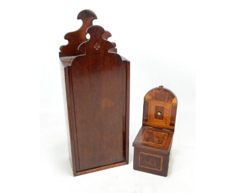 A late George III mahogany candle box with shaped back plate and similarly decorated front slide, height 43cm, and a small 19