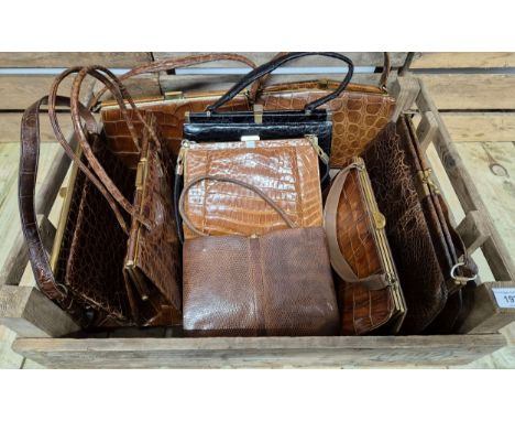 A collection of nine vintage British made crocodile &amp; lizard skin clutch hand bags 