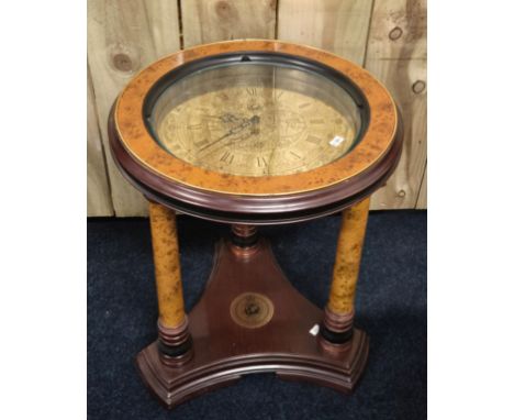 The Royal Geographical Society Clock Table. Comes with leaflet. [49cm high, 41cm diameter] 
