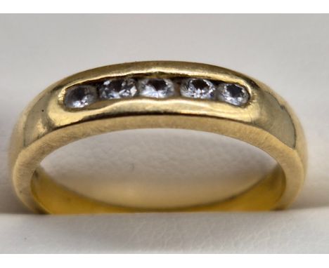 18ct yellow gold and diamond stone ring. Fitted with five round cut diamonds. [Ring size Q] [5.78GRAMS] 