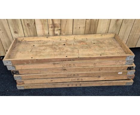A collection of six vintage bread trays U.C.B.S company 